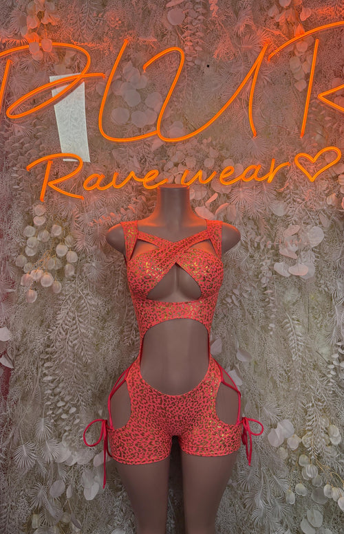 Coral cheetah bodysuit with lace-up front, cutouts, and tie side straps.