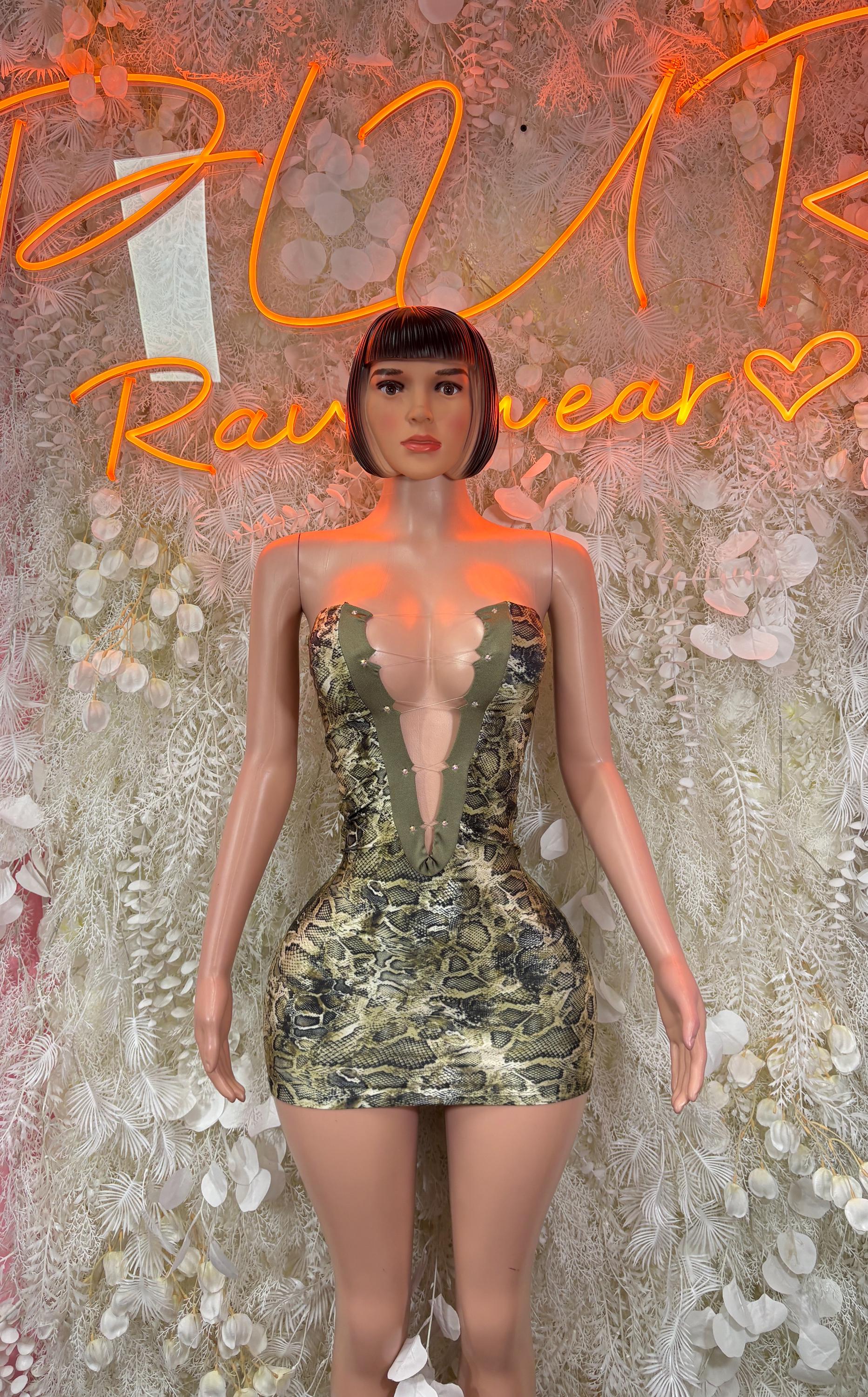 Snake print mini dress, plunging V neckline, fitted bodycon style.