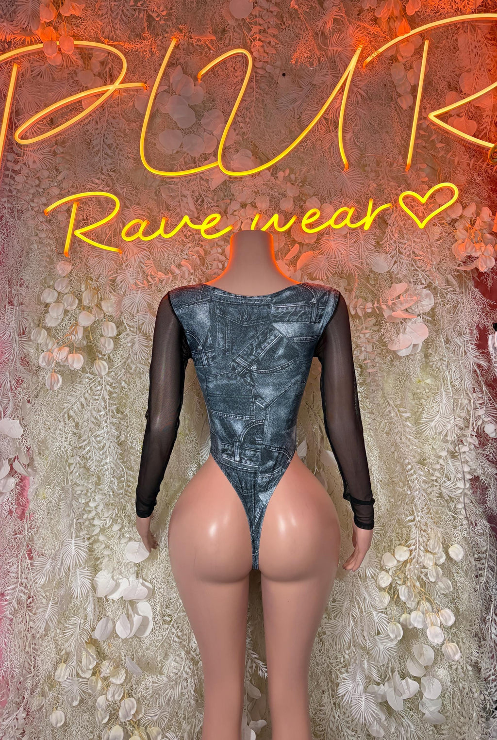 Denim-print bodysuit with sheer black sleeves and low back opening