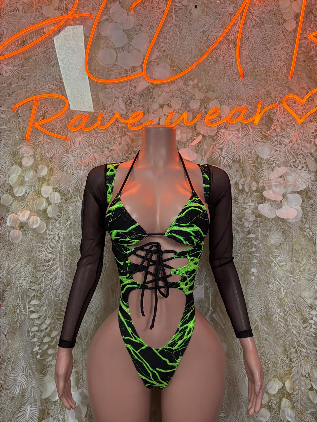 Black and green lightning one-piece bodysuit with lace-up front and mesh sleeves