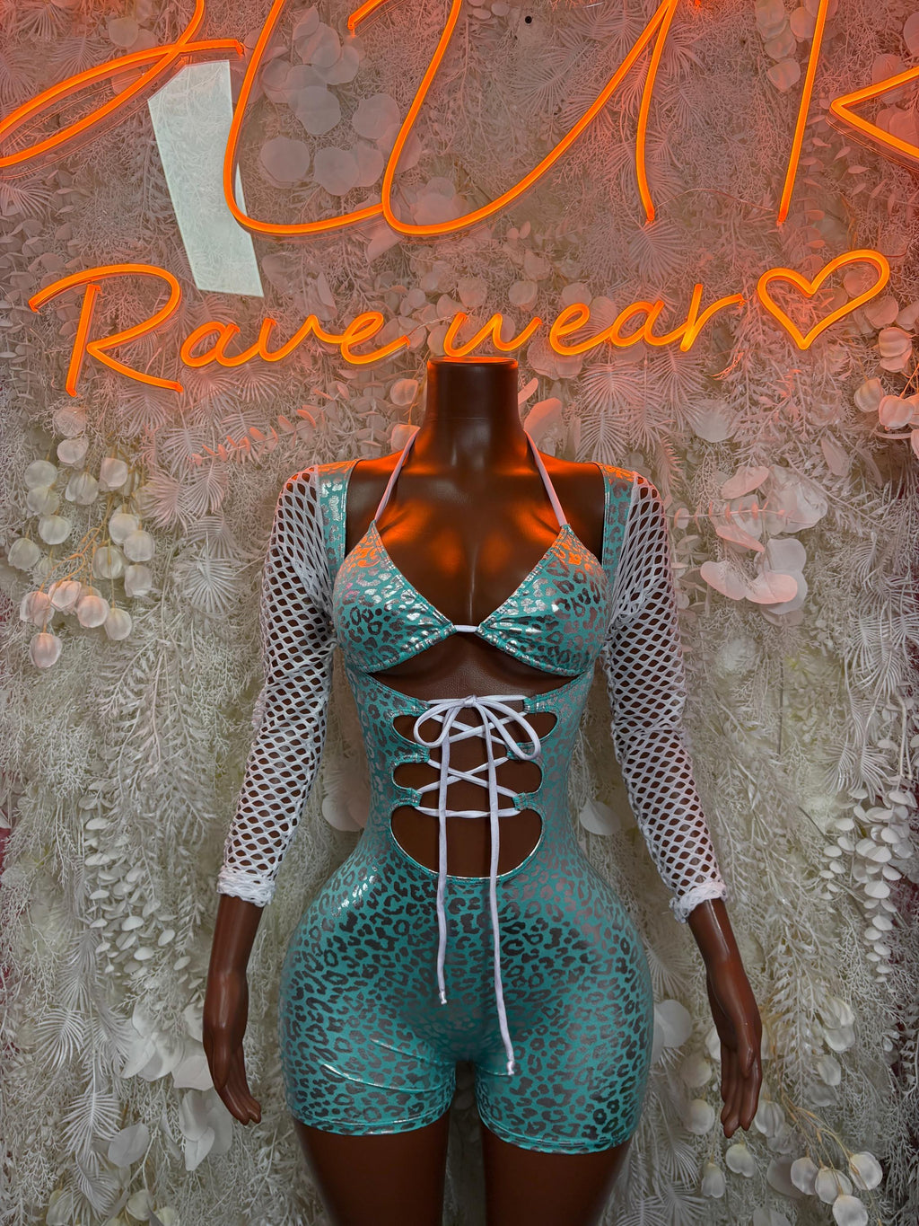 Turquoise cheetah-print bodysuit with long mesh sleeves and front lace-up