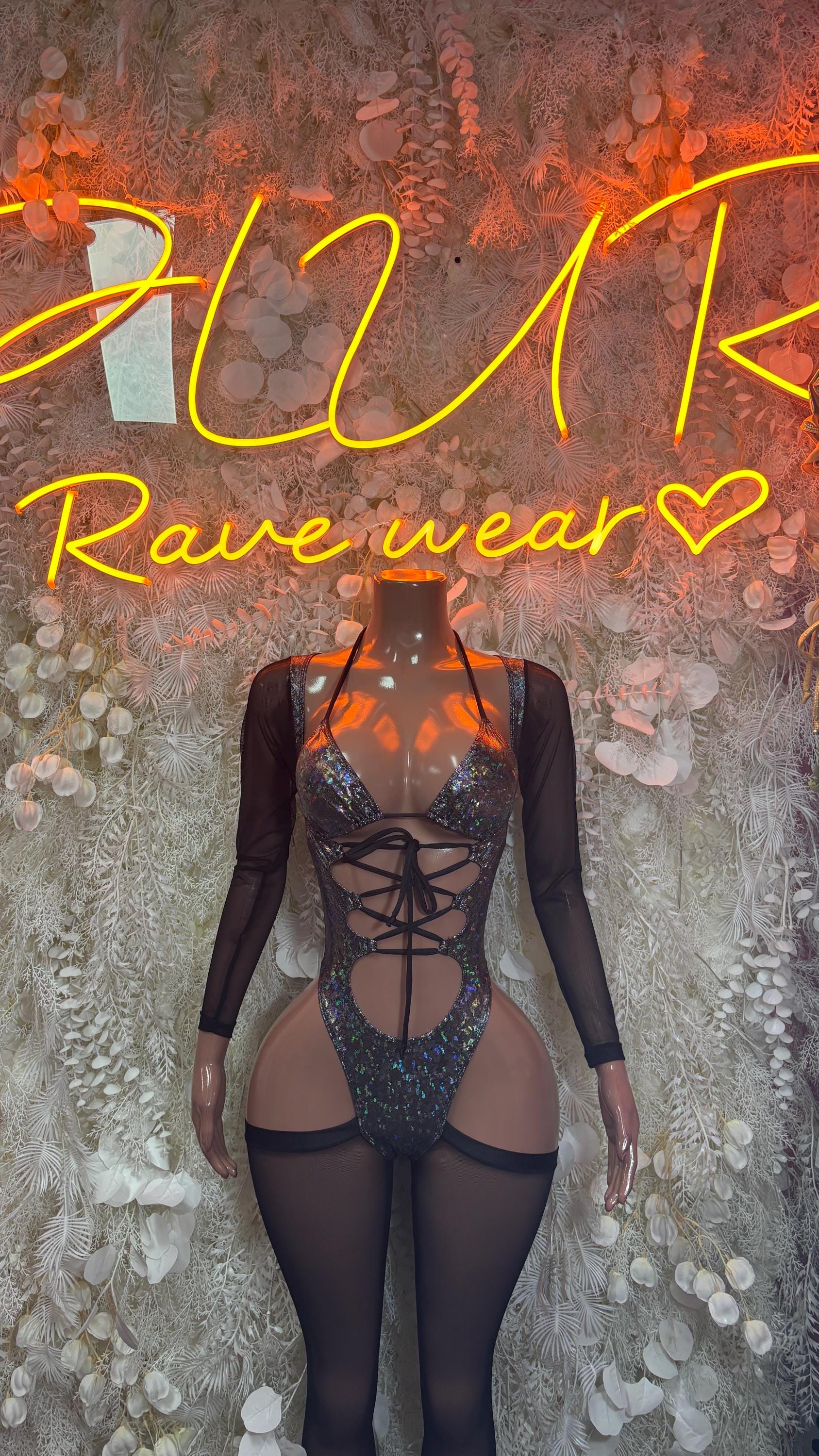 Metallic black long-sleeve bodysuit with lace-up front and sheer cutout panels