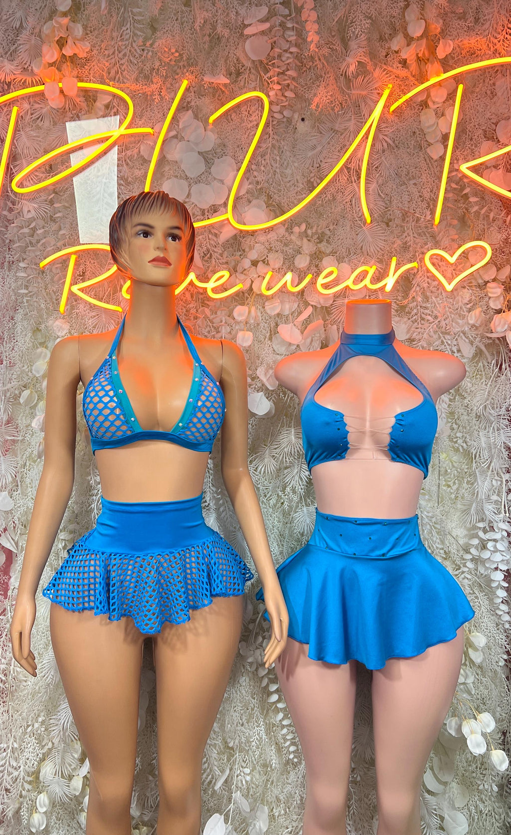 Blue halter crop top with textured cups and flared mini skirt set