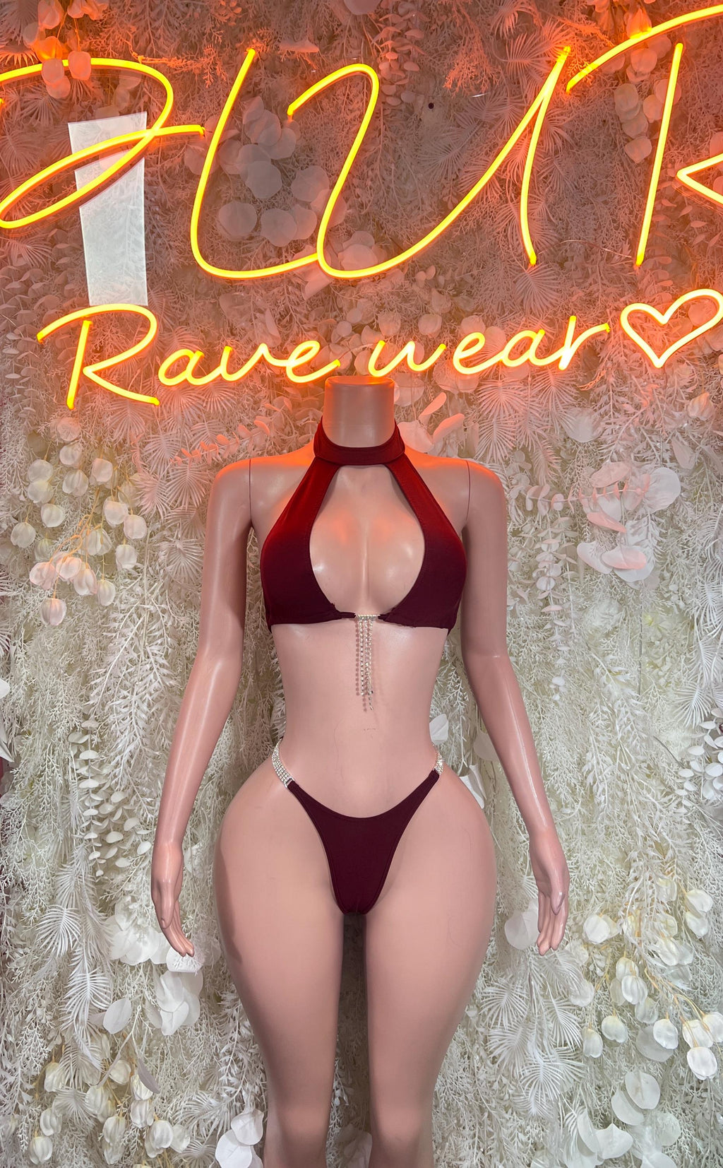 Burgundy halter rave bikini with cutout front and high-leg bottoms
