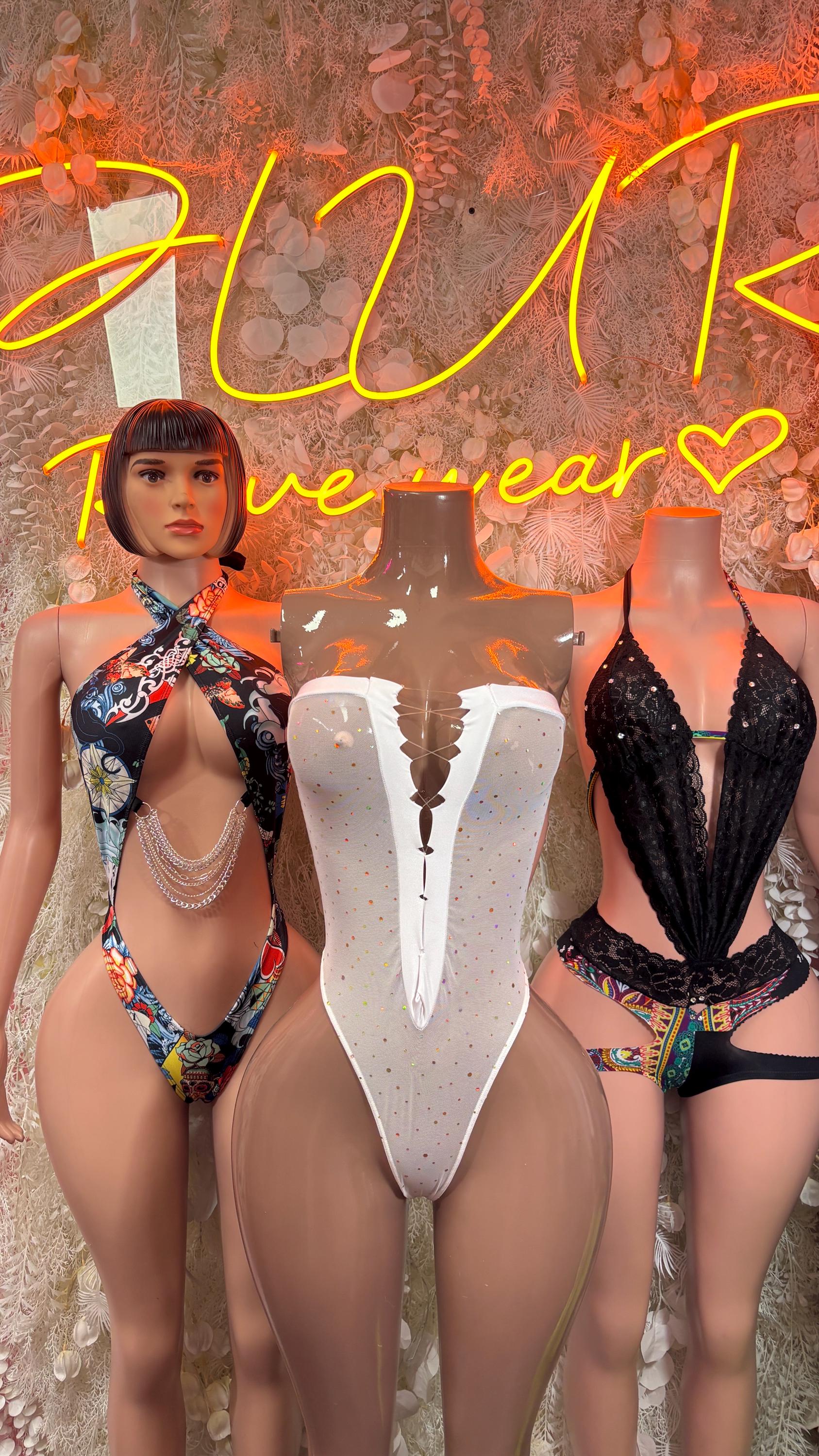 White sleeveless bodysuit with deep V front and high-cut leg on model