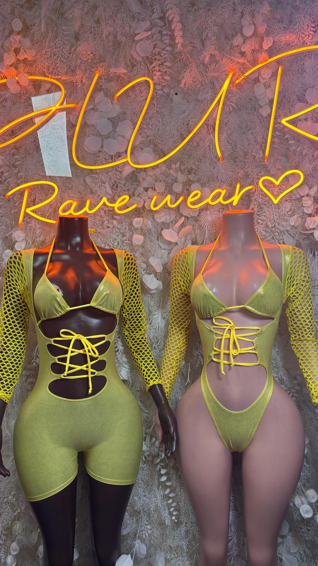Lime green and pale pink lace-up bodysuits with long mesh sleeves, shown together