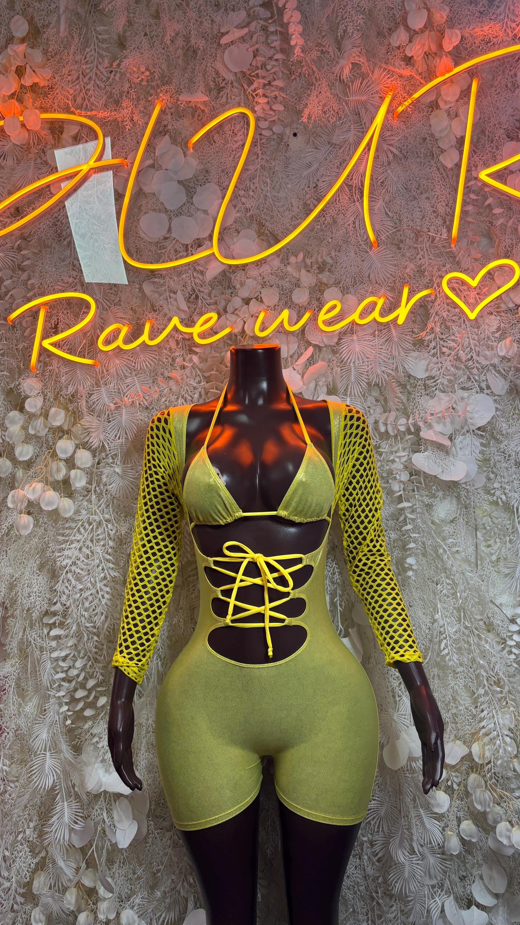 Lime yellow lace-up bodysuit with long mesh sleeves and cutout black front panel