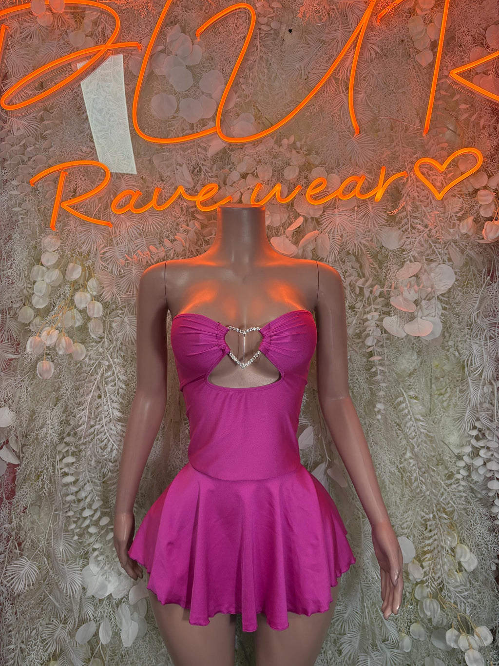 Fuchsia pink sweetheart mini dress with bow detail and flared skirt, one-piece