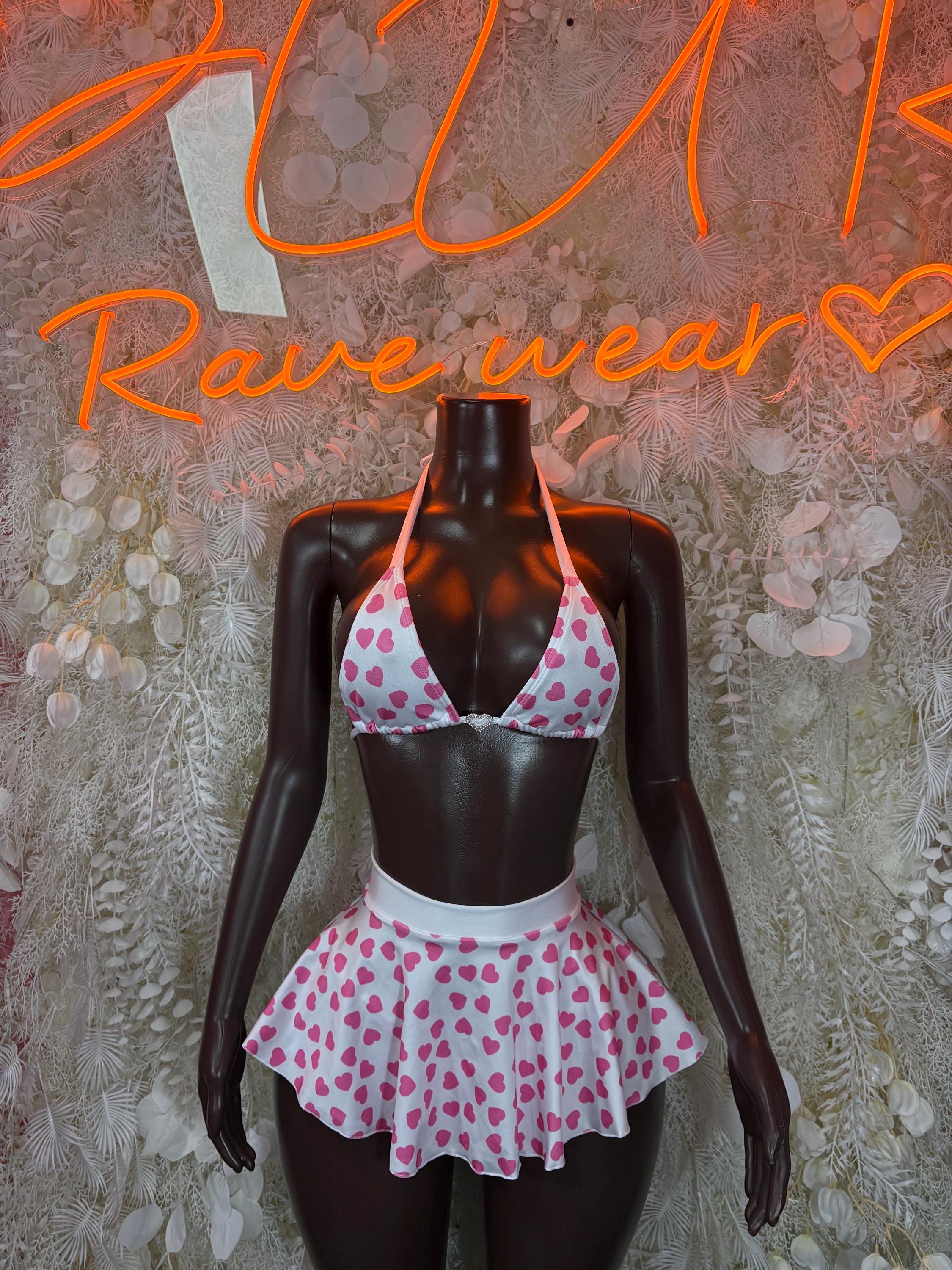 Two-piece mini dress with pink heart triangle bikini top and flared heart-print skirt