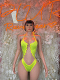 Neon green rave bodysuit with high-leg cut and lace-up front