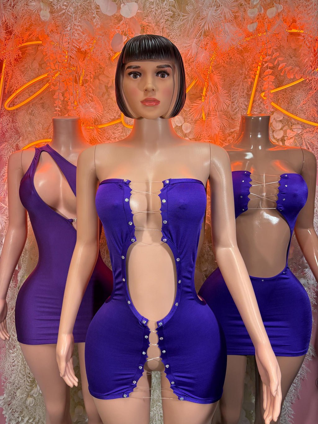 Purple corset-style mini dress with sweetheart bust, center front buttons and waist cutout