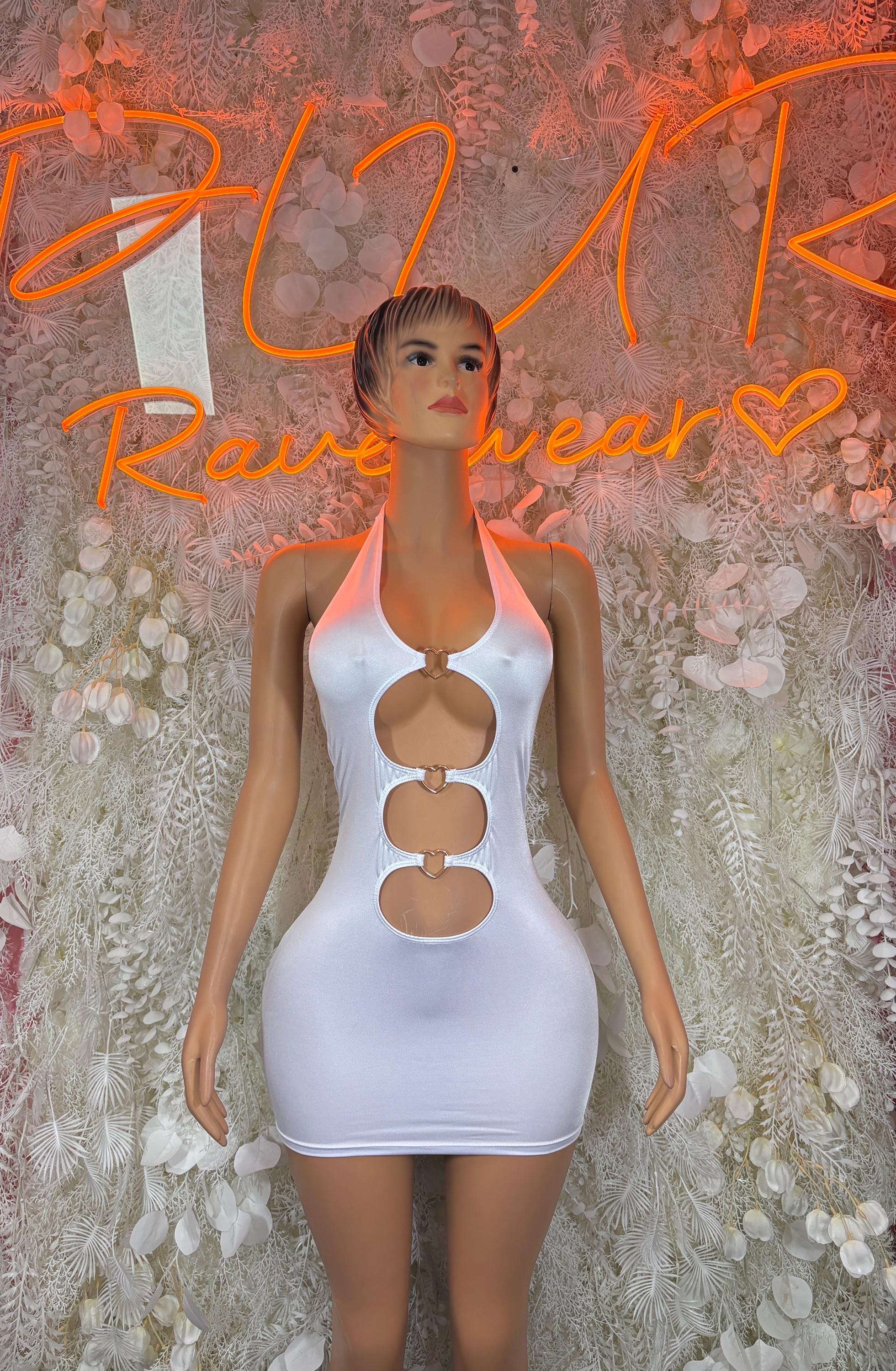 White halter mini dress with circular cutouts and open back, sleeveless festival style