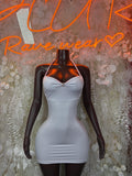 White halter mini dress with ruched bust