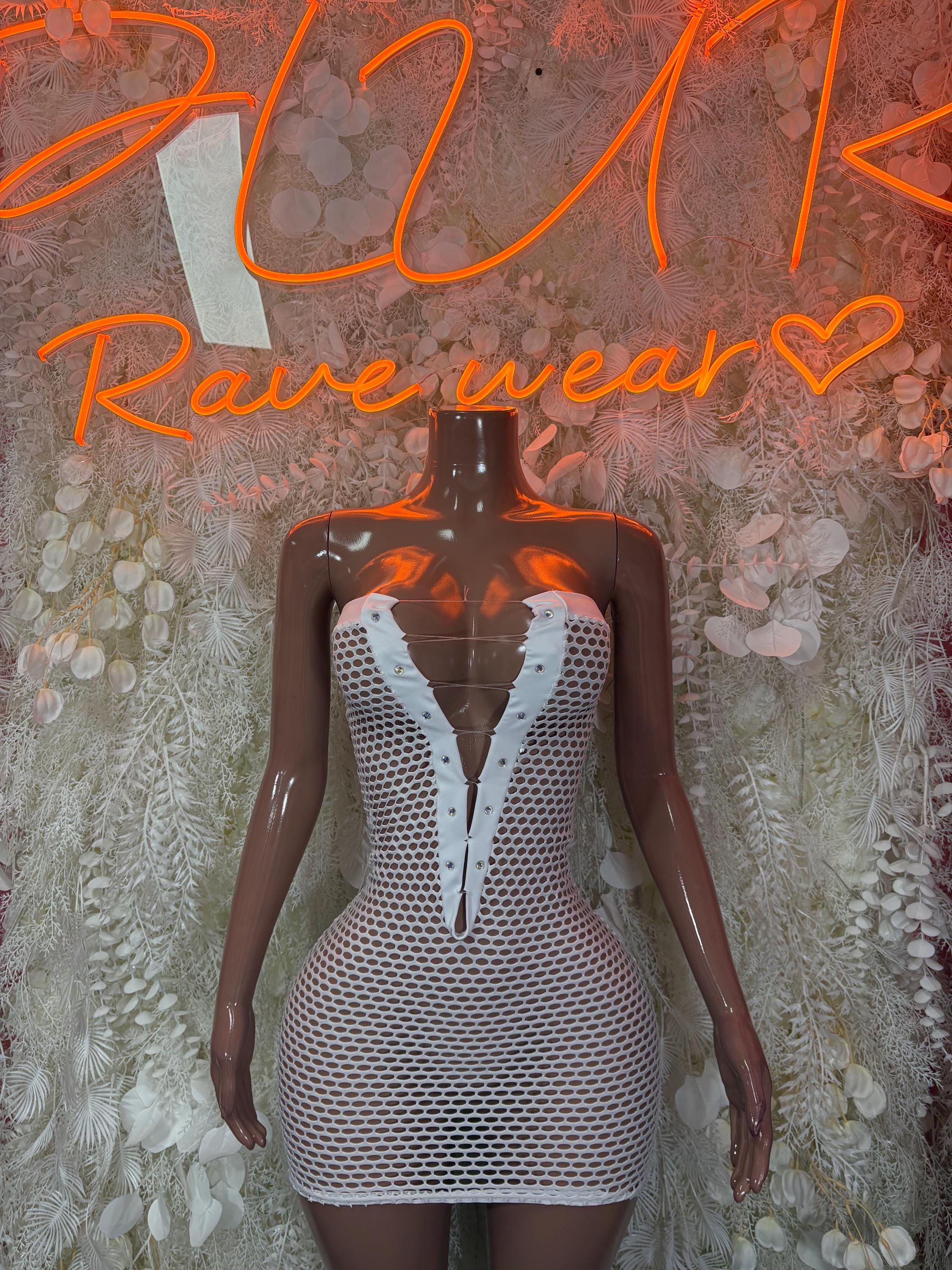 White one-piece fishnet mini dress with plunging V neckline and mesh straps