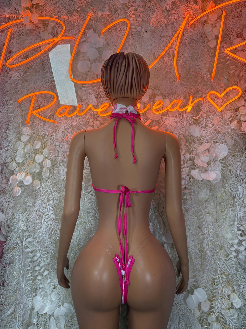 Pink and white two-piece bikini set with tie halter back and tie-string bottoms