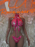 Pink heart-pattern two-piece lingerie: halter bra and tie-front bikini bottom