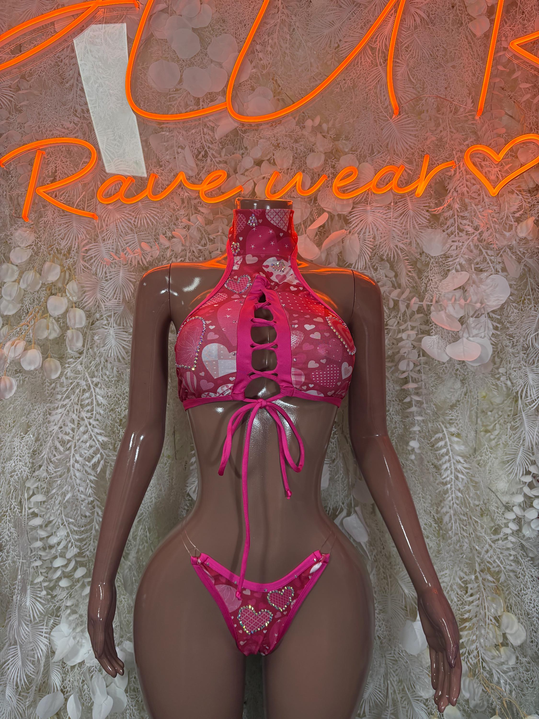 Pink heart-pattern two-piece lingerie: halter bra and tie-front bikini bottom
