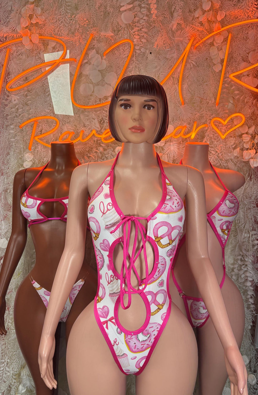 Heart-print one-piece lingerie with lace trim, pink tie-neck and open back