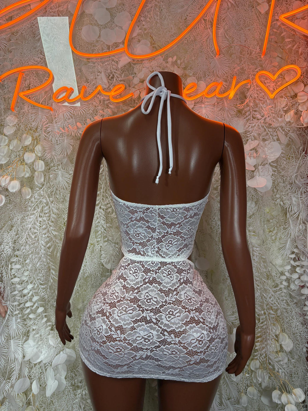 White lace mini dress with halter tie straps and open back