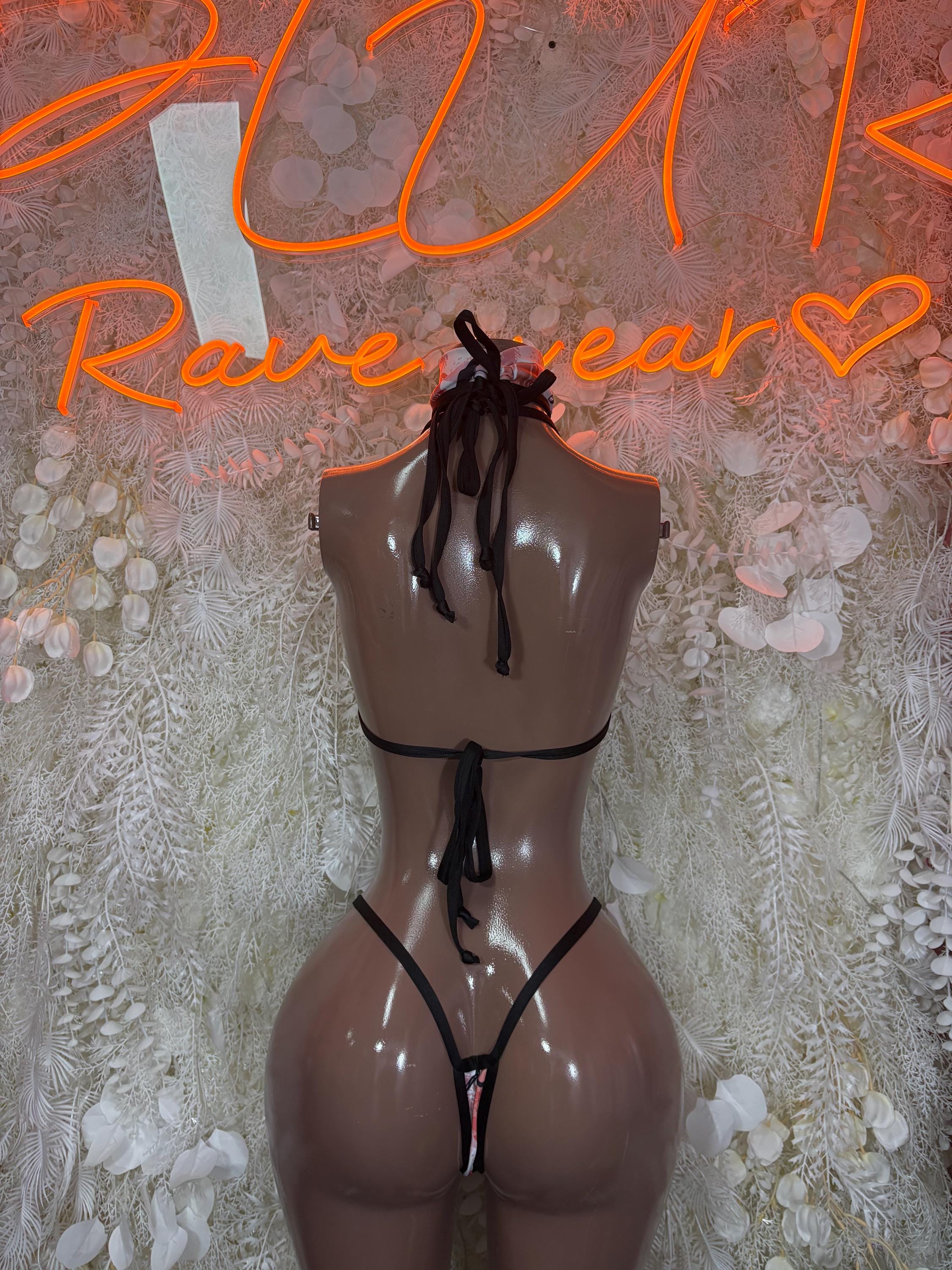 Rave two-piece lingerie set, black harness bra with matching heart-print thong