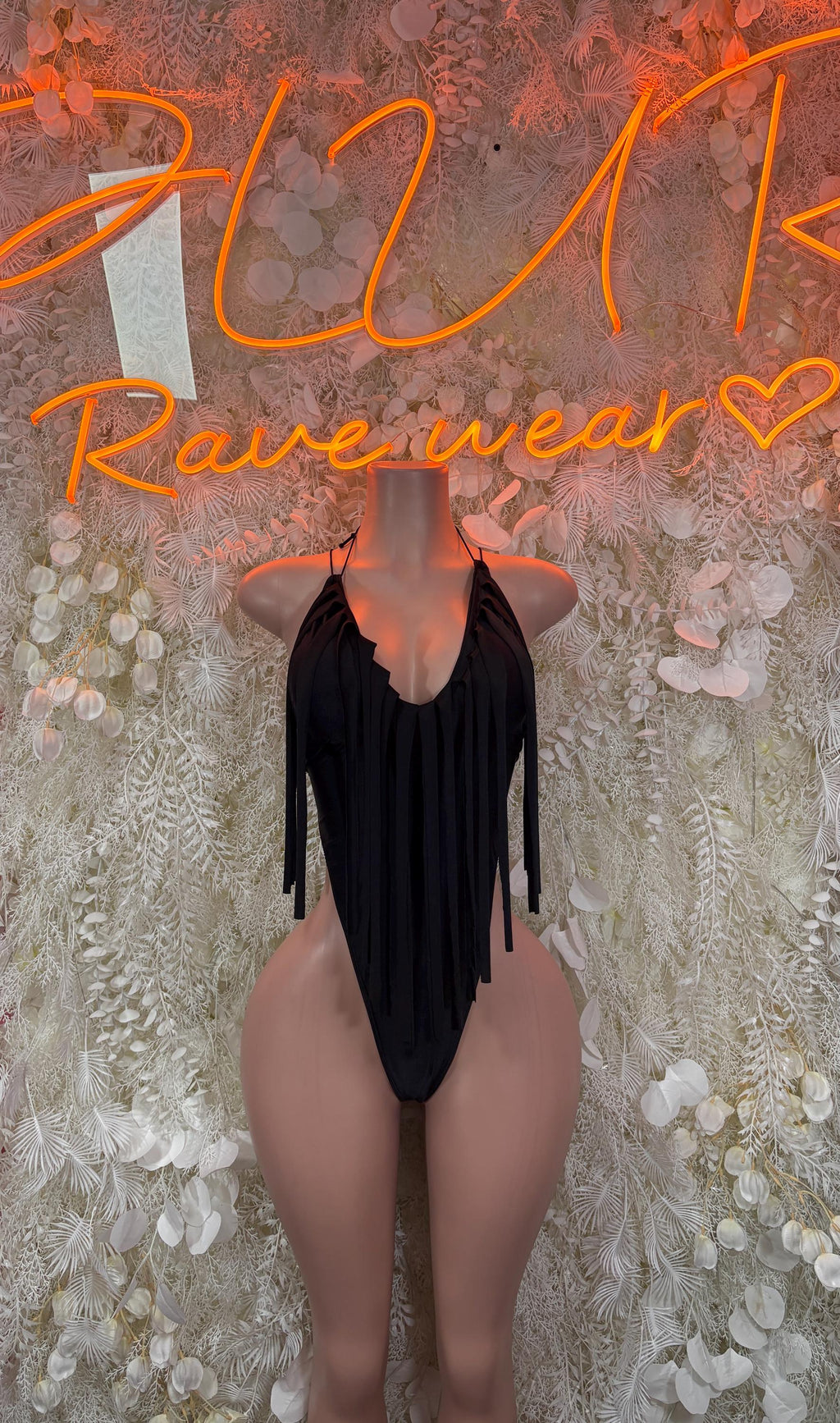 Black fringe bodysuit with deep V neckline and long tassel ties on sides