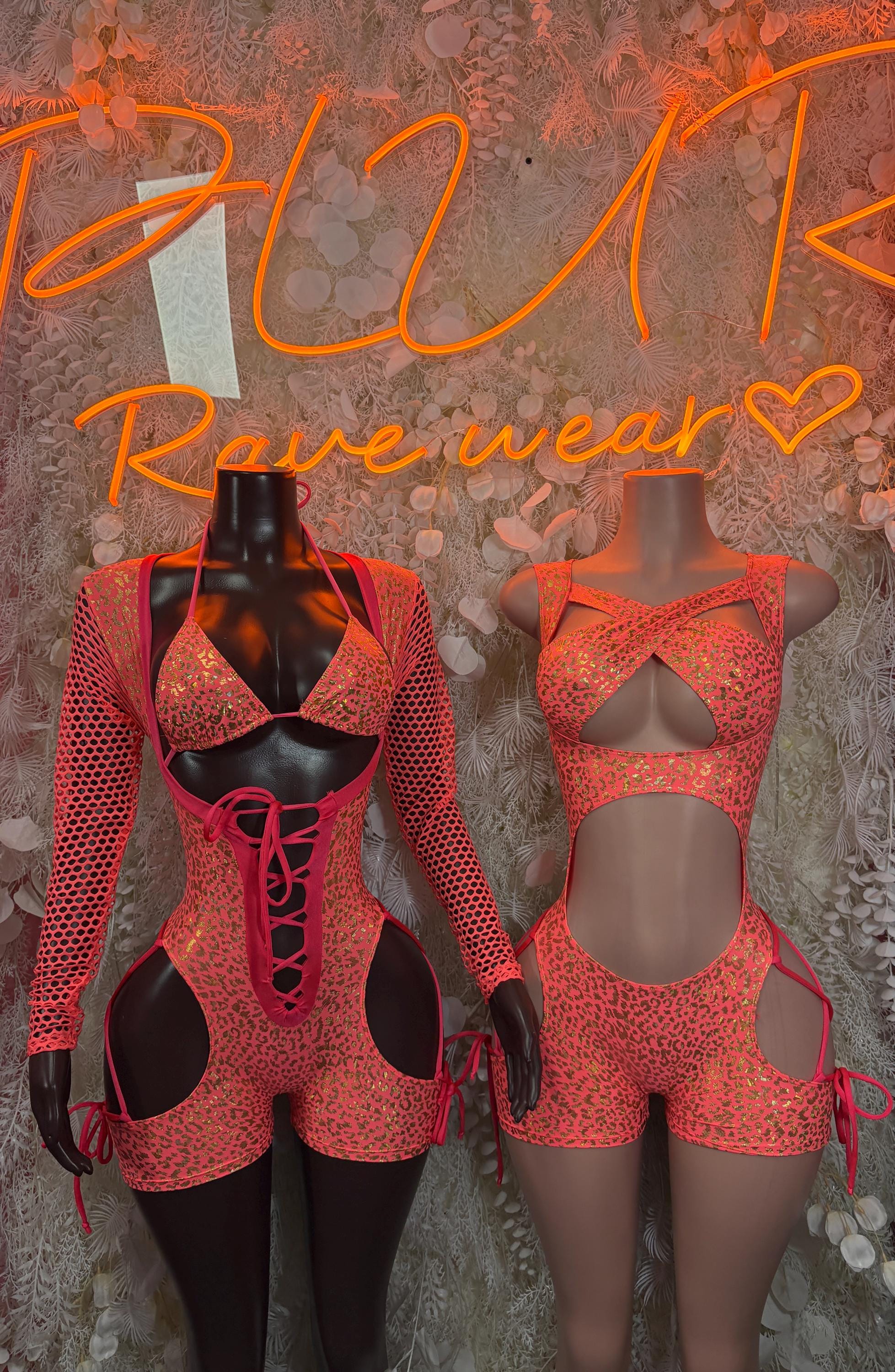 Coral cheetah mesh bodysuit set: lace-up front with cutout sides on two mannequins.