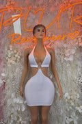 White halter mini dress with cutout front and knotted bust detail