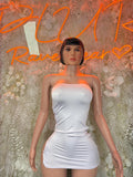 White strapless mini dress with ruched bodice and fitted bodycon silhouette