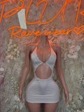 White cutout bodycon dress with halter neckline and front keyhole cutout