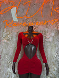 Red long-sleeve mini dress with heart-shaped chest cutout on fitted silhouette