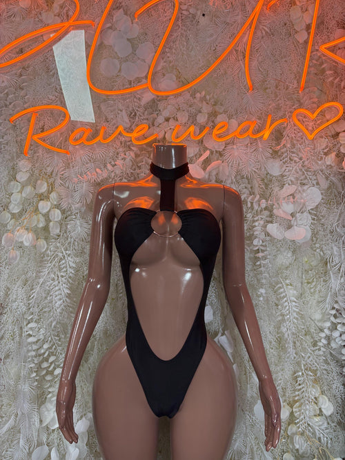 Black one-piece bodysuit with plunging neckline and central keyhole cutout.