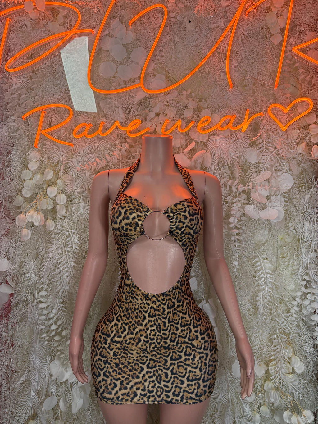 Leopard print performance dress with halter neckline and chest cutout
