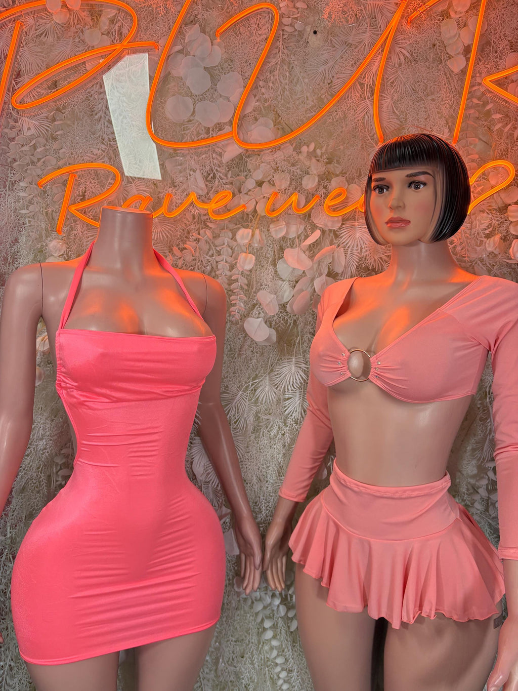 Pink sleeveless mini dress and peach long-sleeve skirt set with ruffled hems