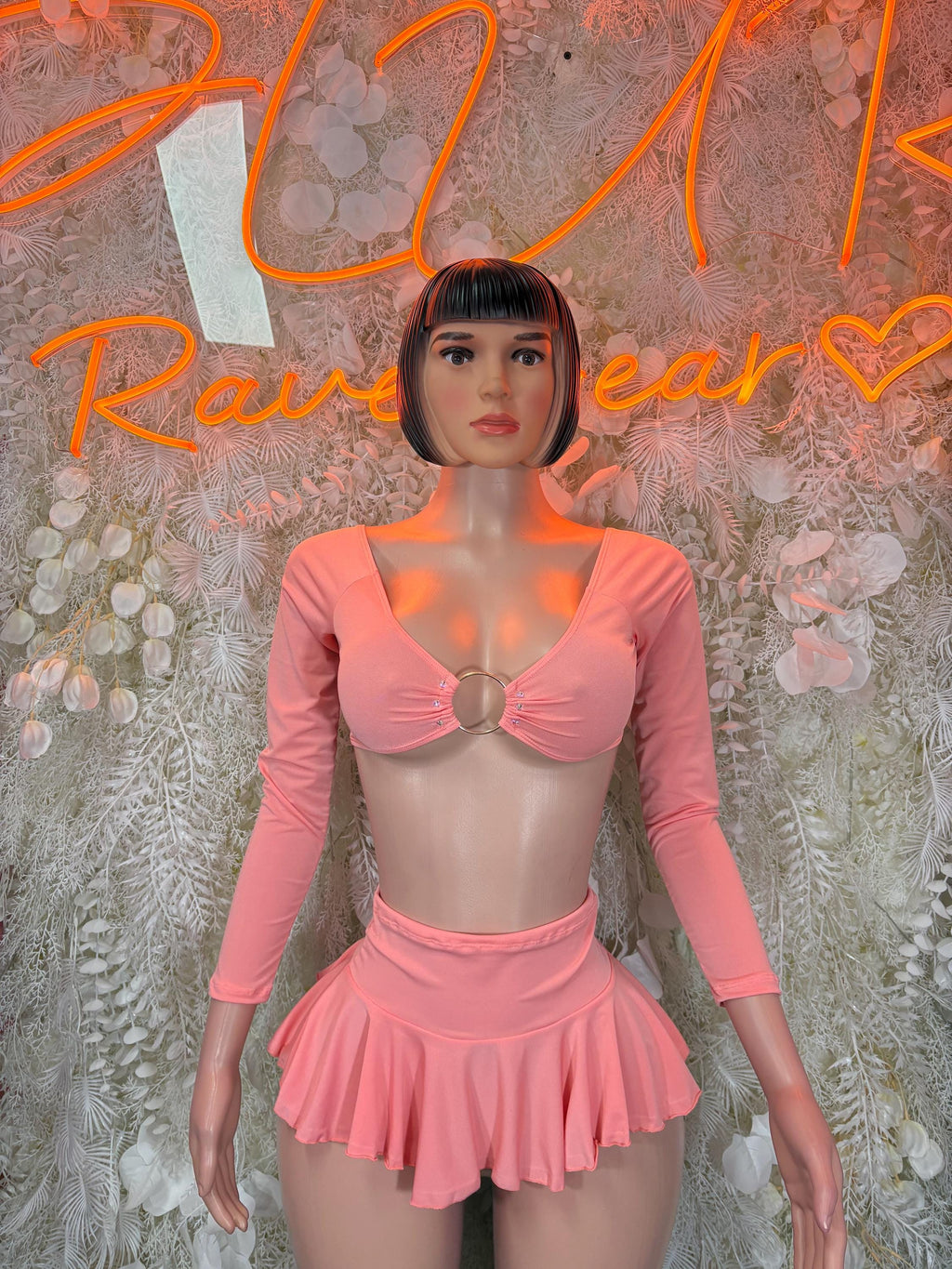Peach long-sleeve crop top and ruffled mini skirt set for women