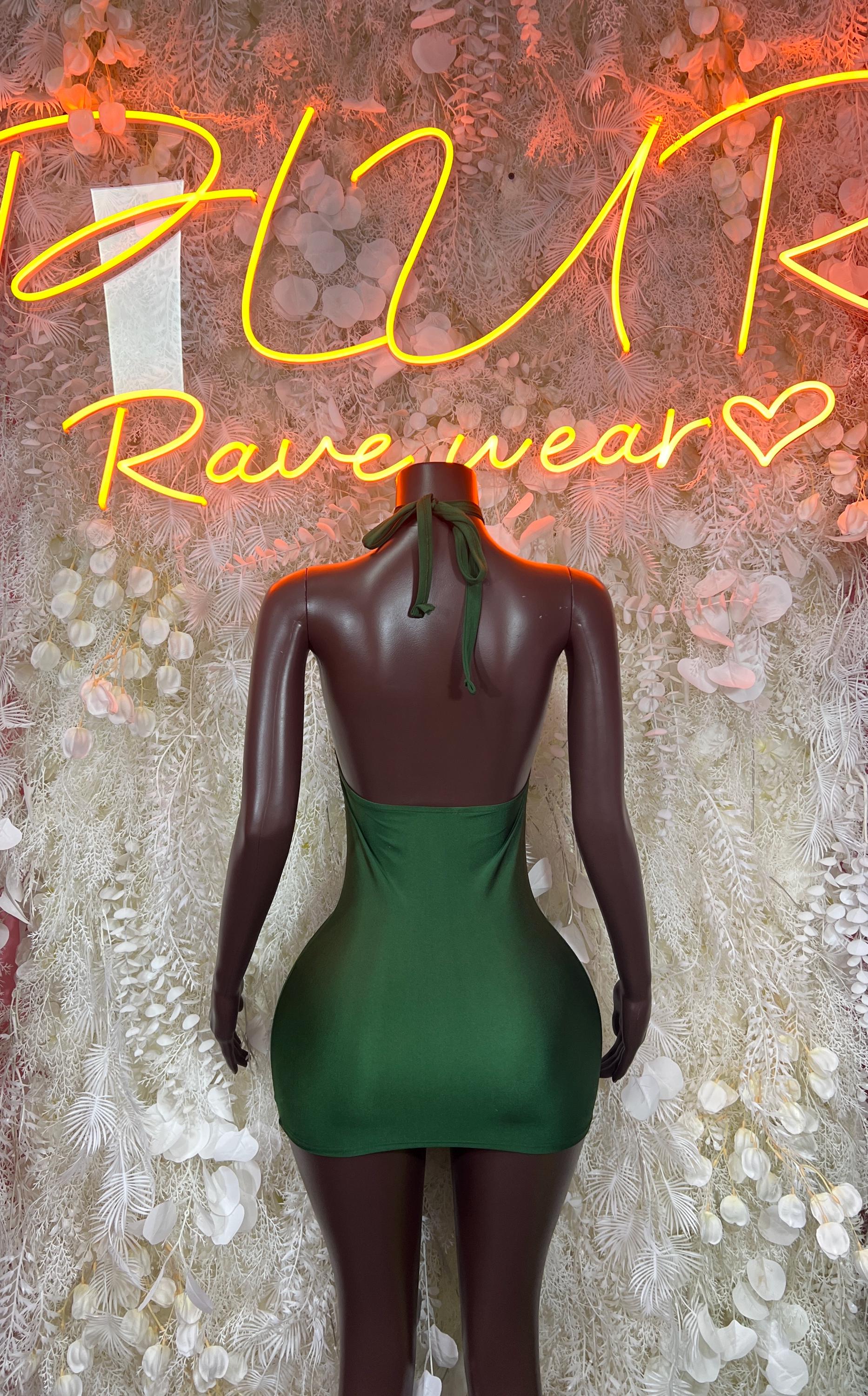 Green halter mini dress back view with open back and fitted ruched skirt