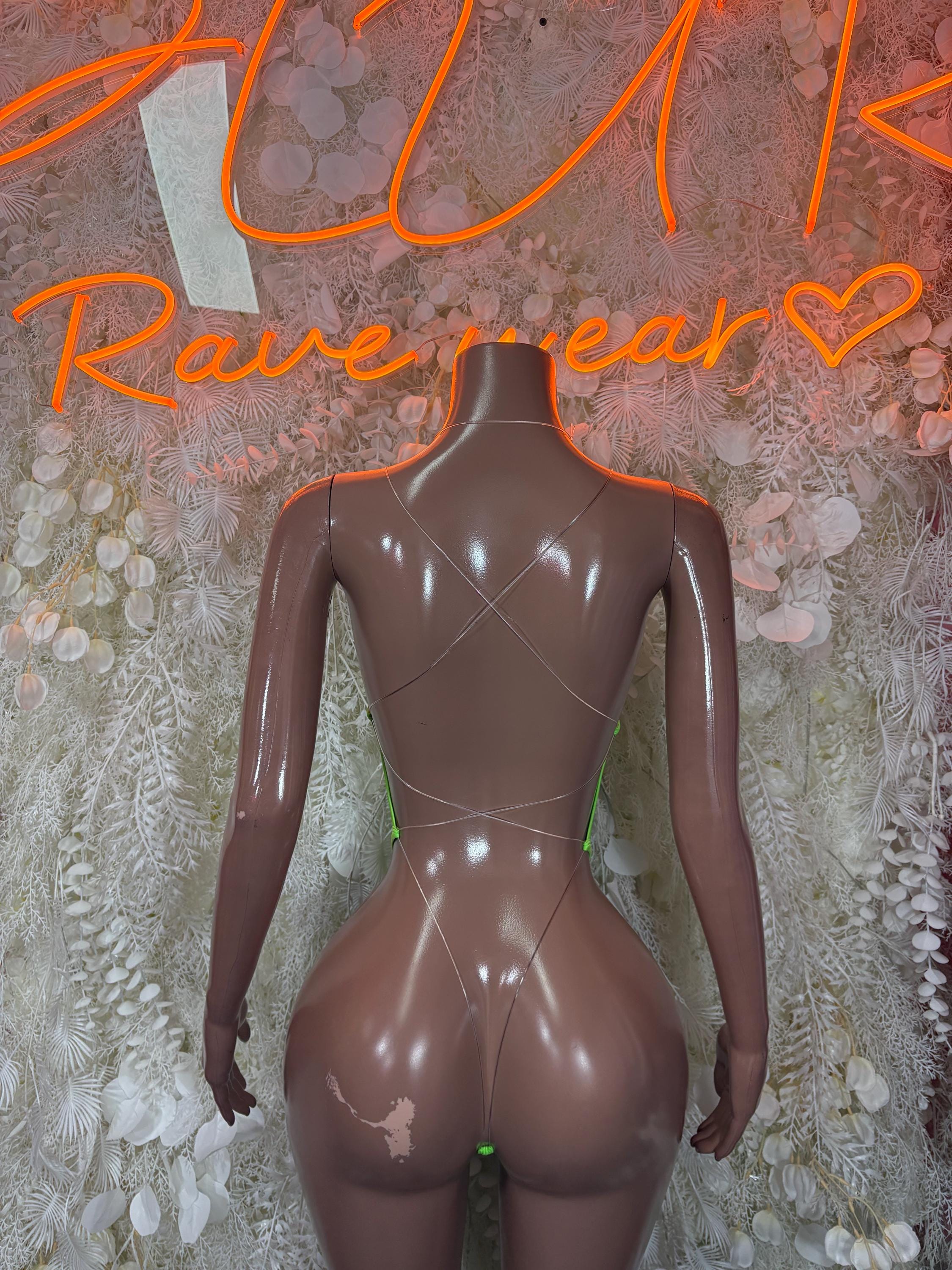 Neon green festival bodysuit back view with low-back cut and high-leg fit