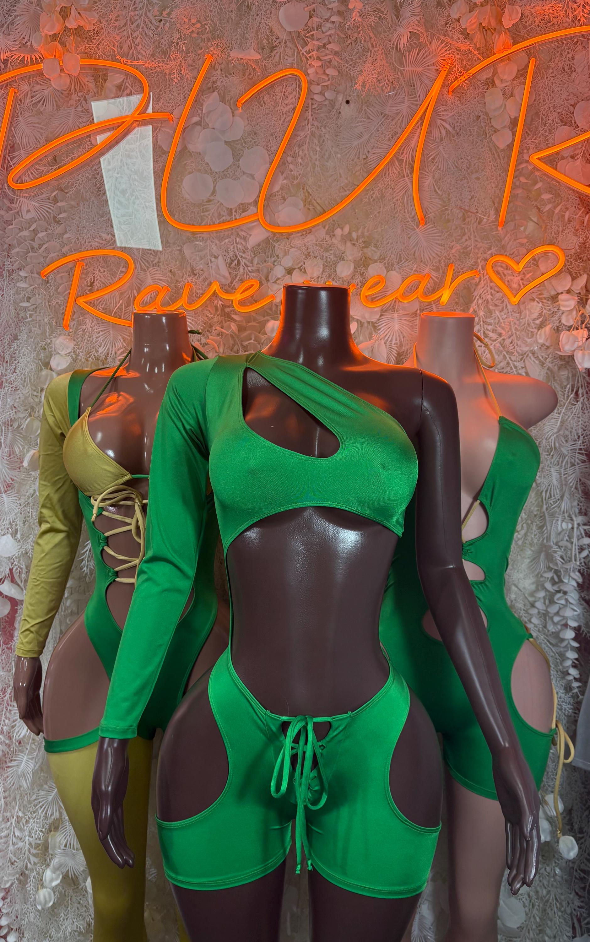 Green bodysuit with long sleeves, open-back cutout, and matching drawstring shorts