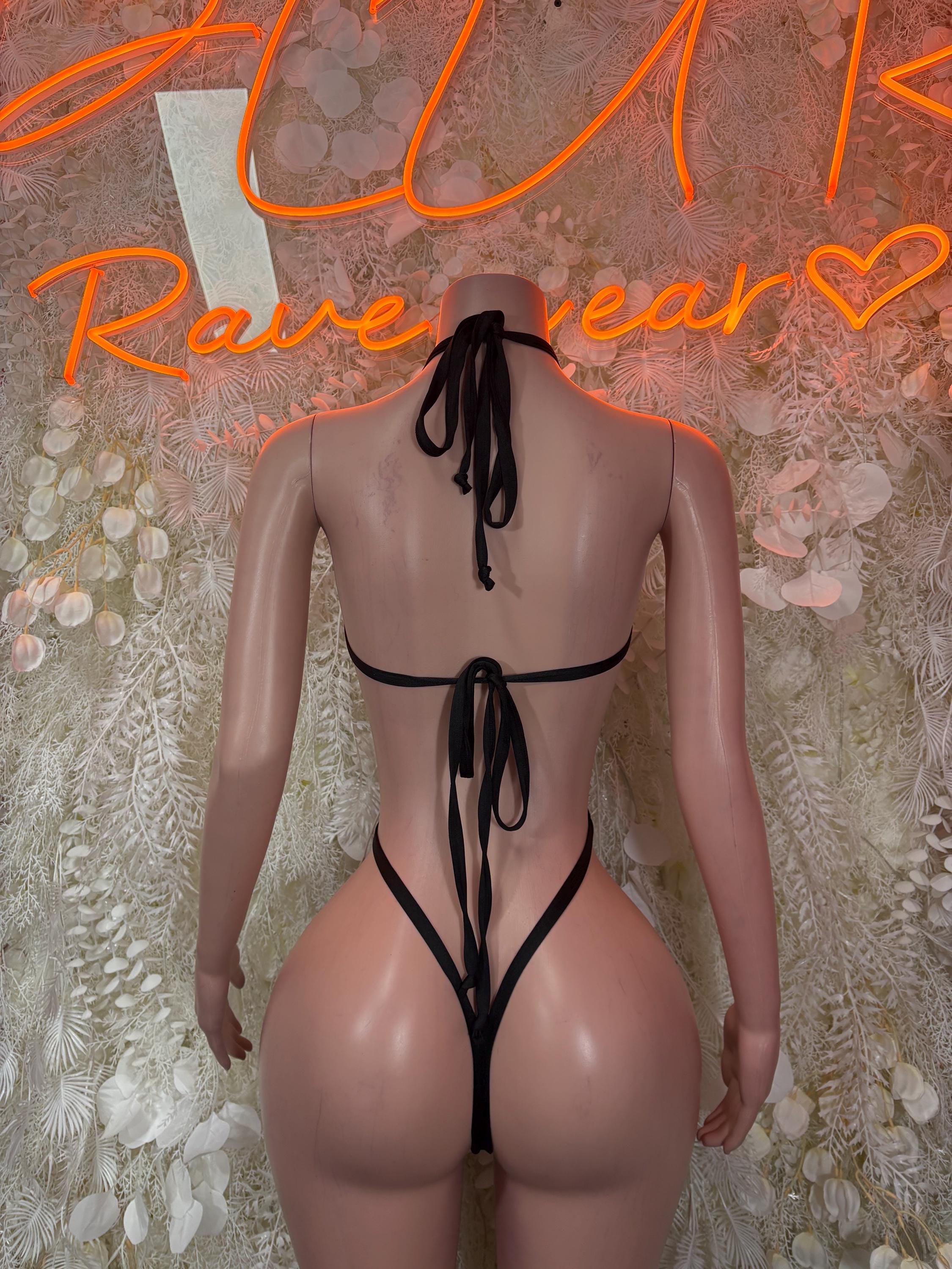 Black heart-pattern lingerie set with lace-up back straps and open thong back