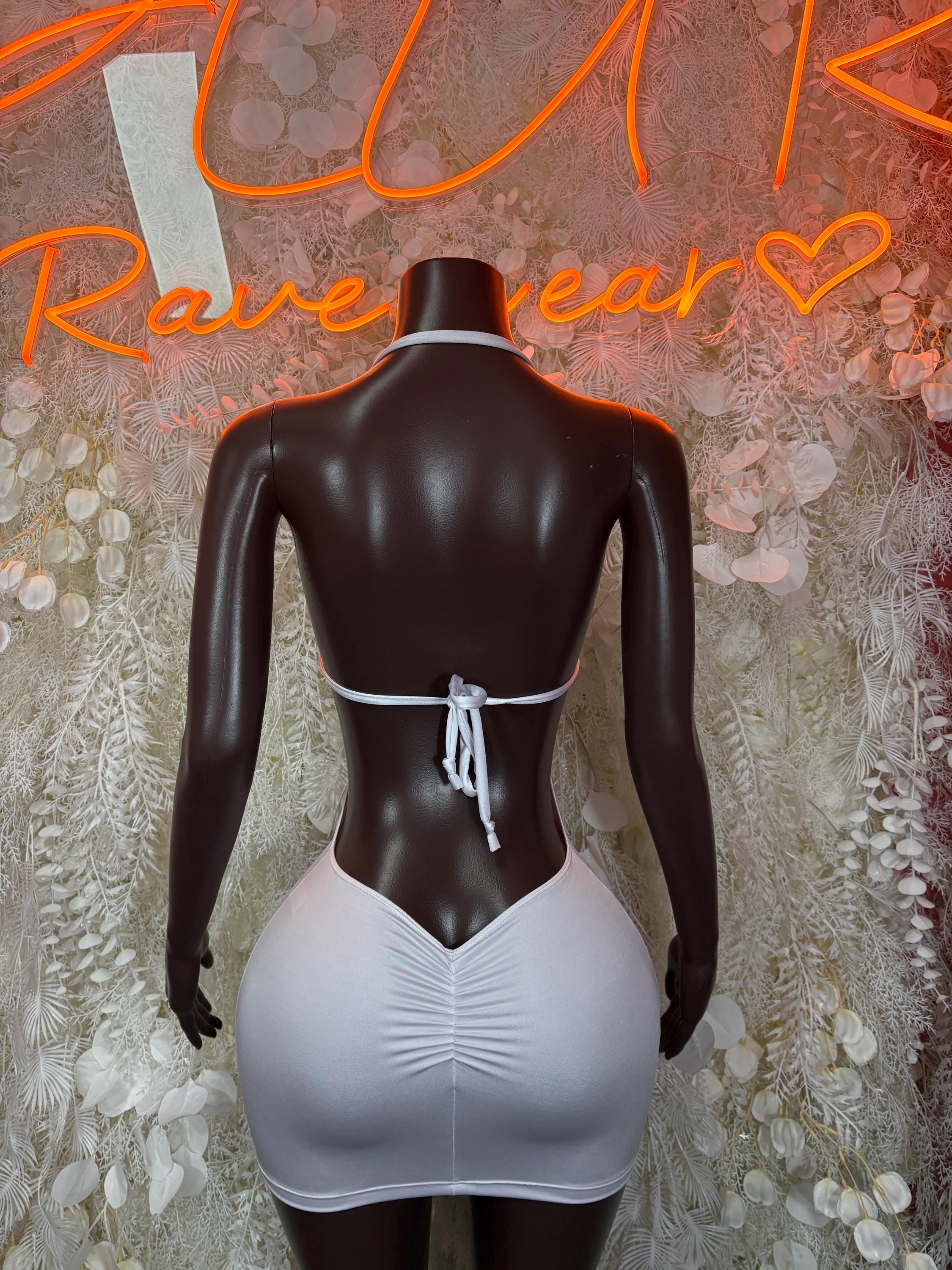 White backless halter mini dress with tie strings at lower back