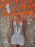 White mini bodycon dress with sweetheart neckline and corset-style lace-up front