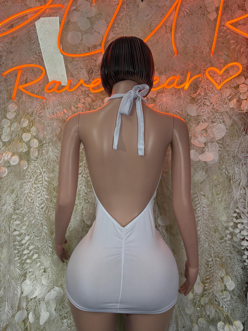 White backless halter mini dress with open V back and neck tie