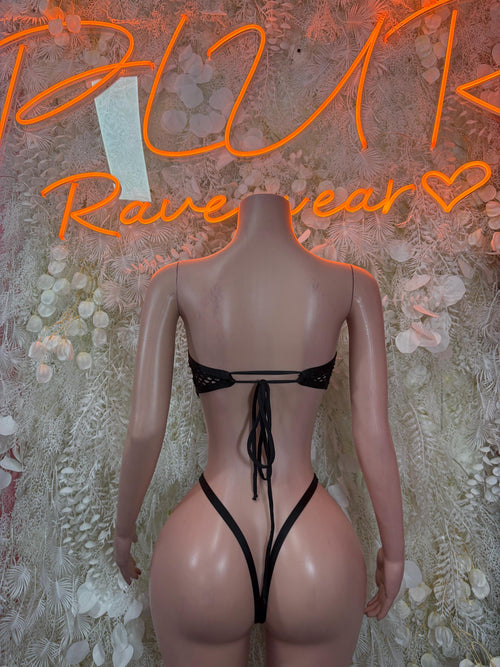 Black fishnet bodysuit with strap bow detail and high-cut back