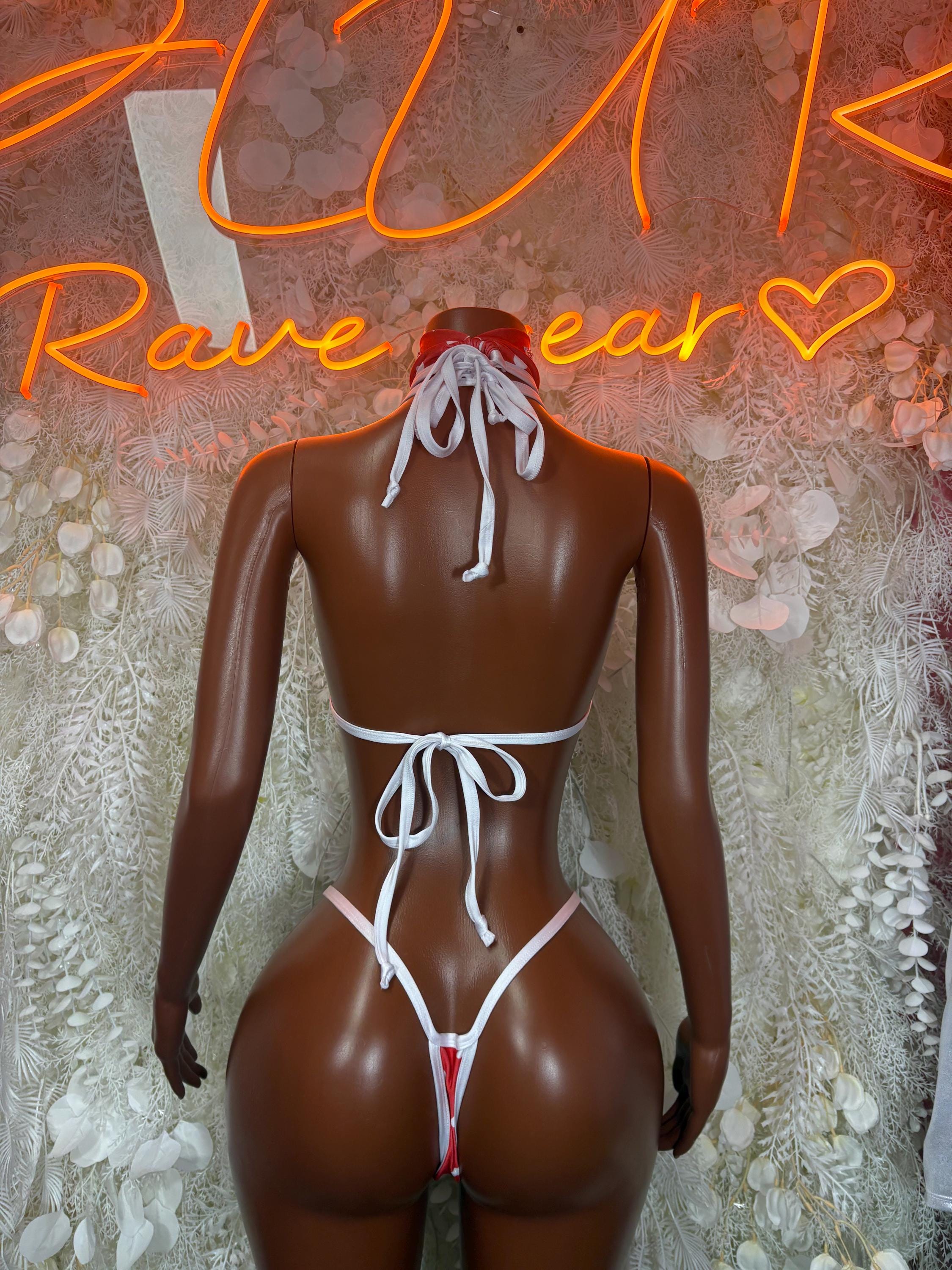 Red heart-print lingerie set with white trim, halter bra and tied back briefs