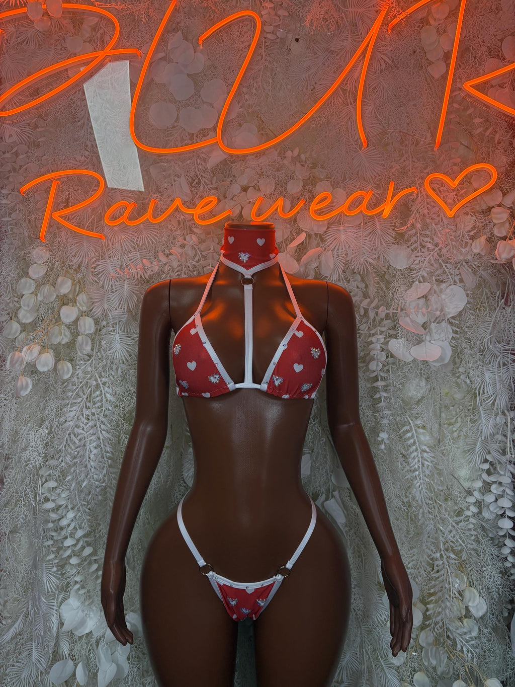 Red heart-print lingerie set with white trim, triangle bra and matching thong