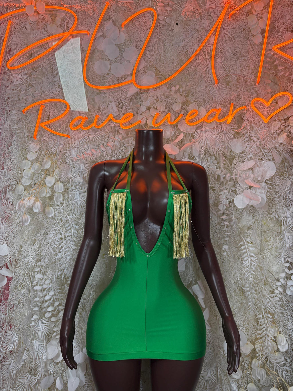Green mini bodysuit dress with deep V neckline and shoulder tassels