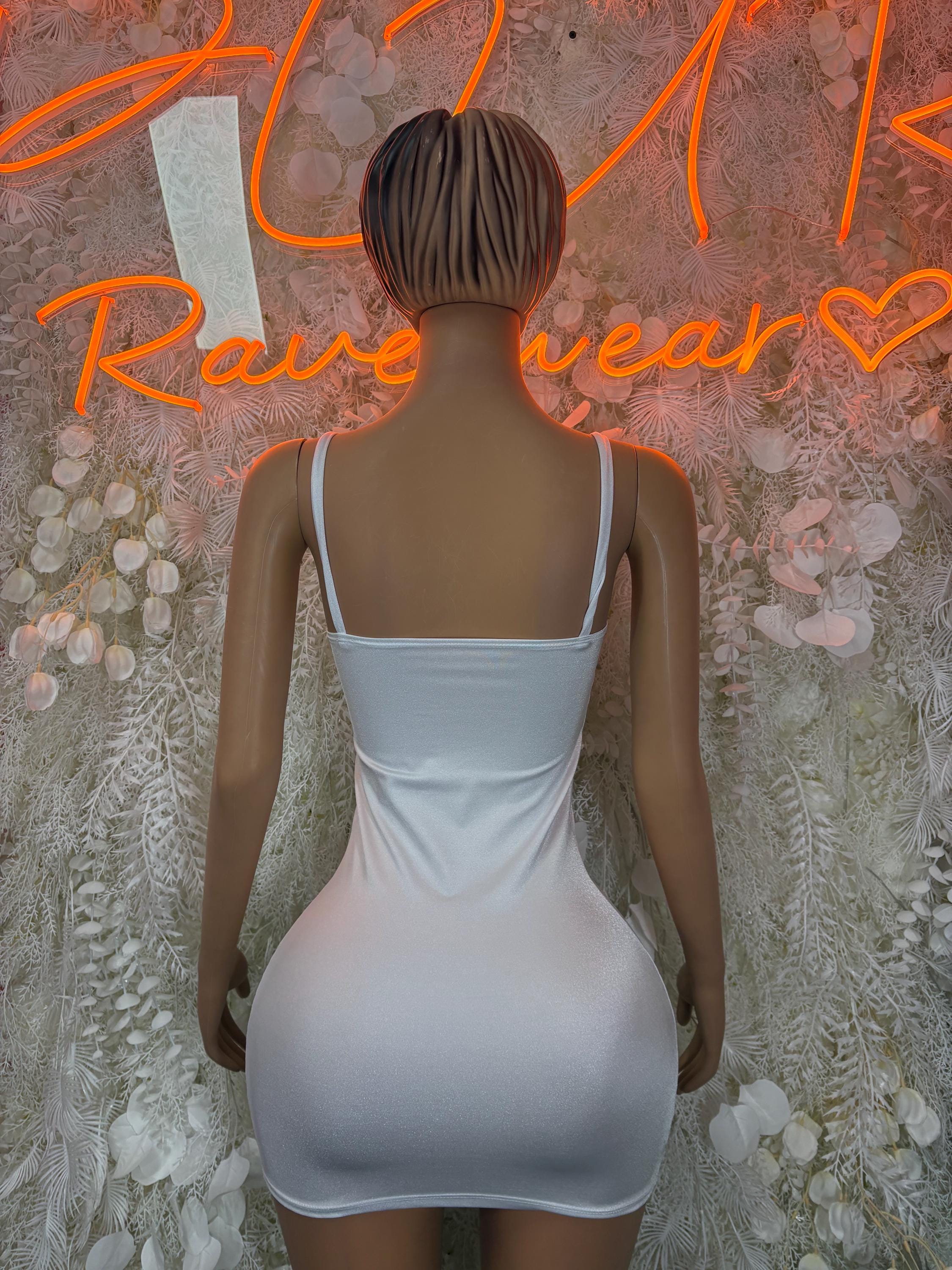 White fitted one-piece mini dress with thin spaghetti straps and scooped back