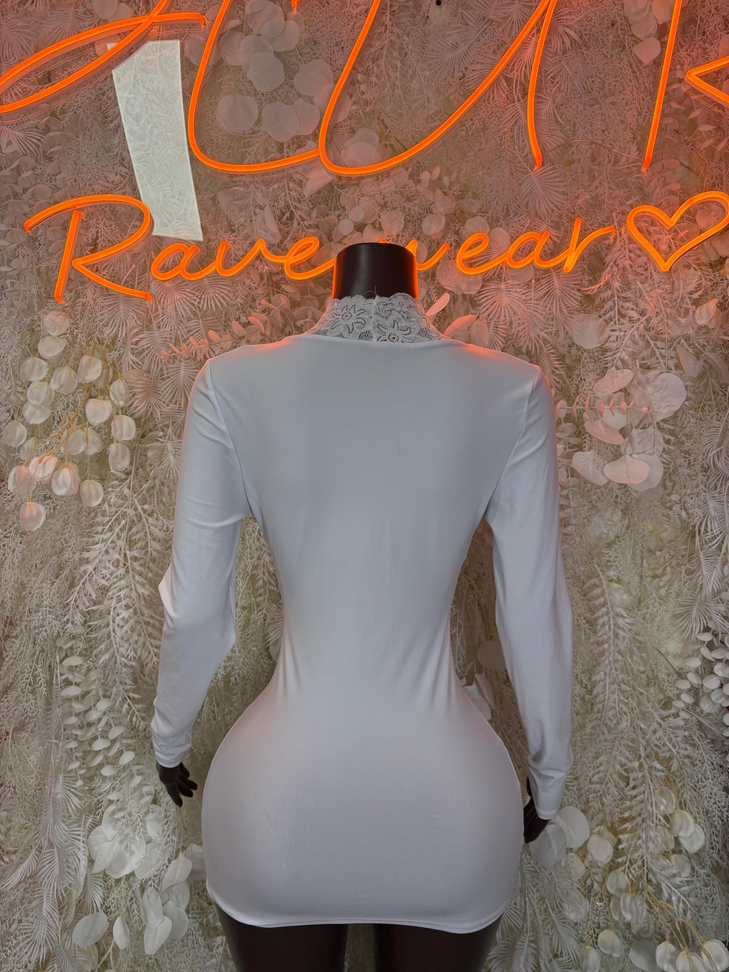 White long-sleeve lace-trim mini dress, back view
