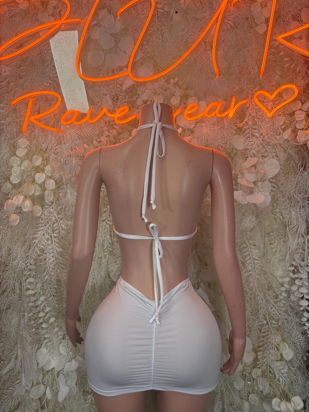 White backless bodycon mini dress with halter tie straps and ruched body