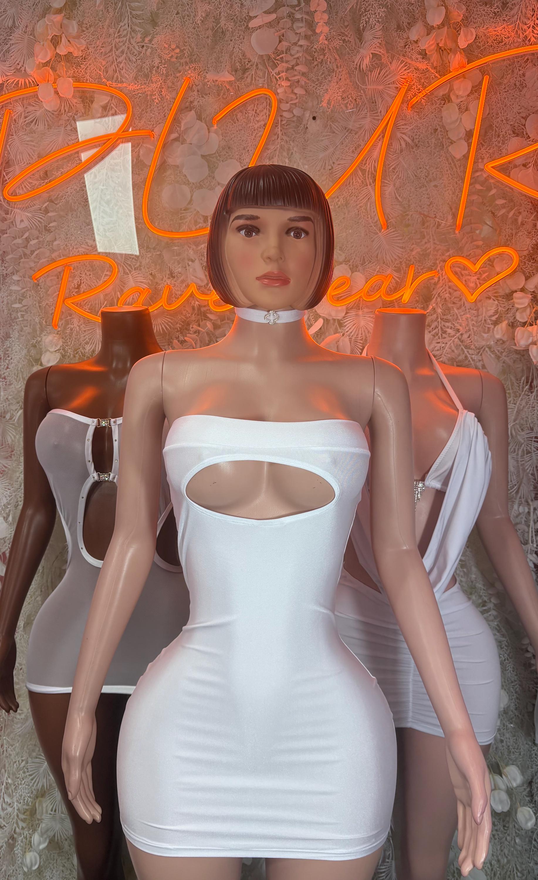 White strapless bodycon mini dress with chest cutout and draped side fabric