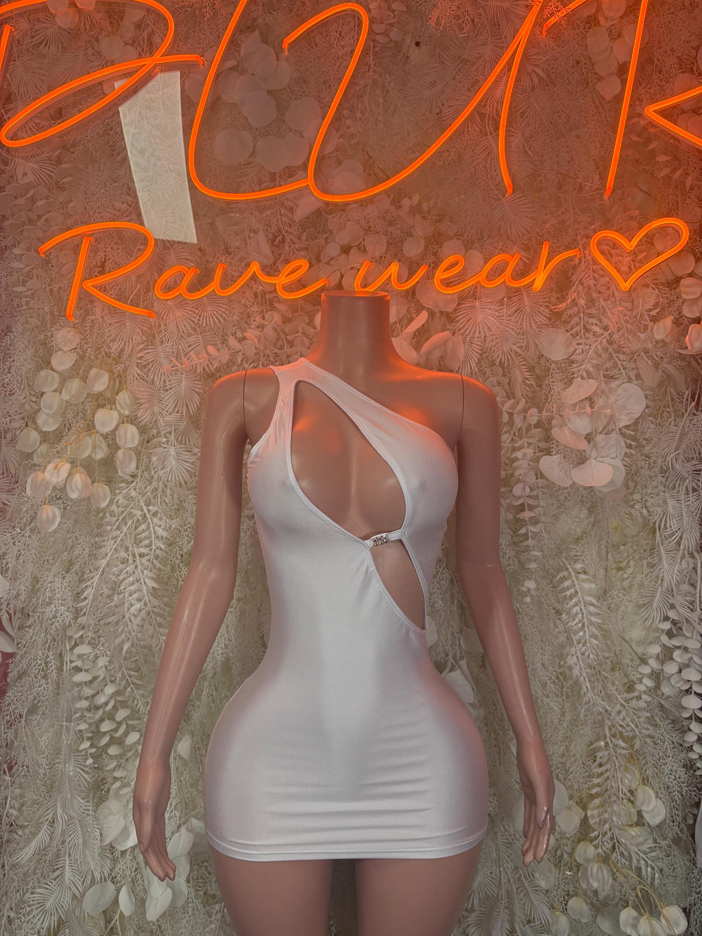 White sleeveless mini dress with halter neckline and ring detail